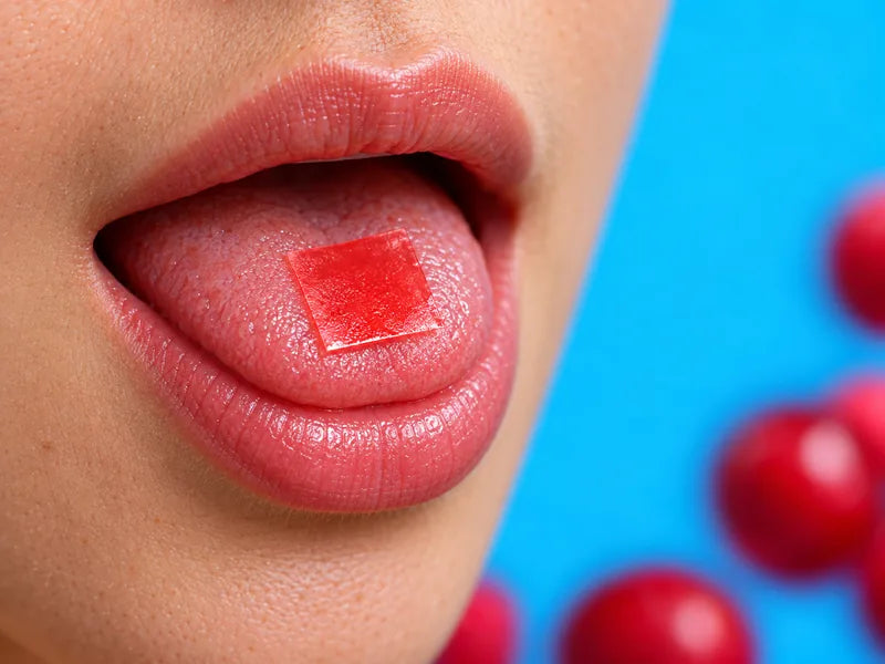 a mouth with a red strip on the tongue