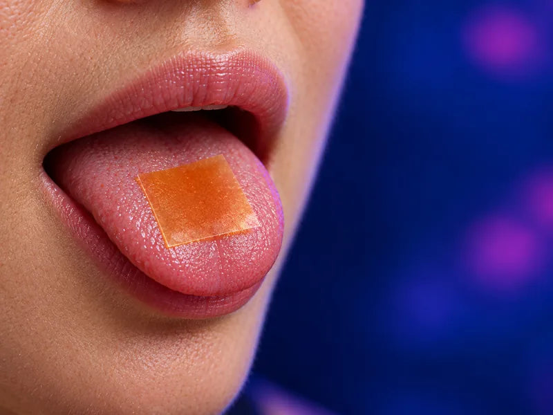 a mouth with an amber strip on the tongue