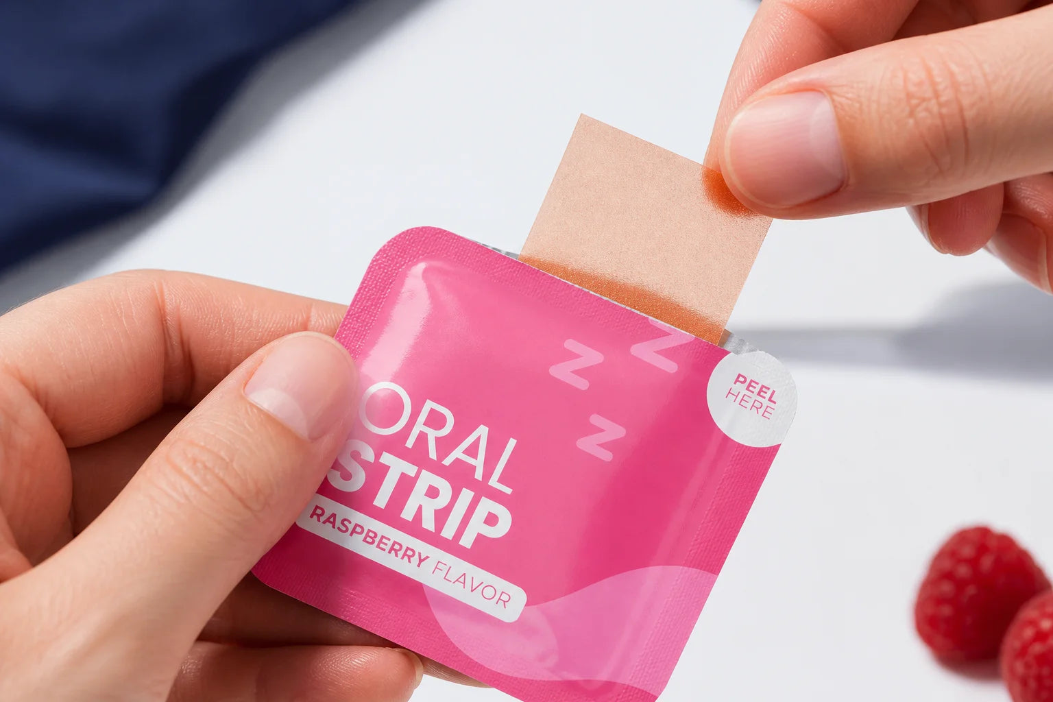 A FUSE oral strip being peeled from its sachet